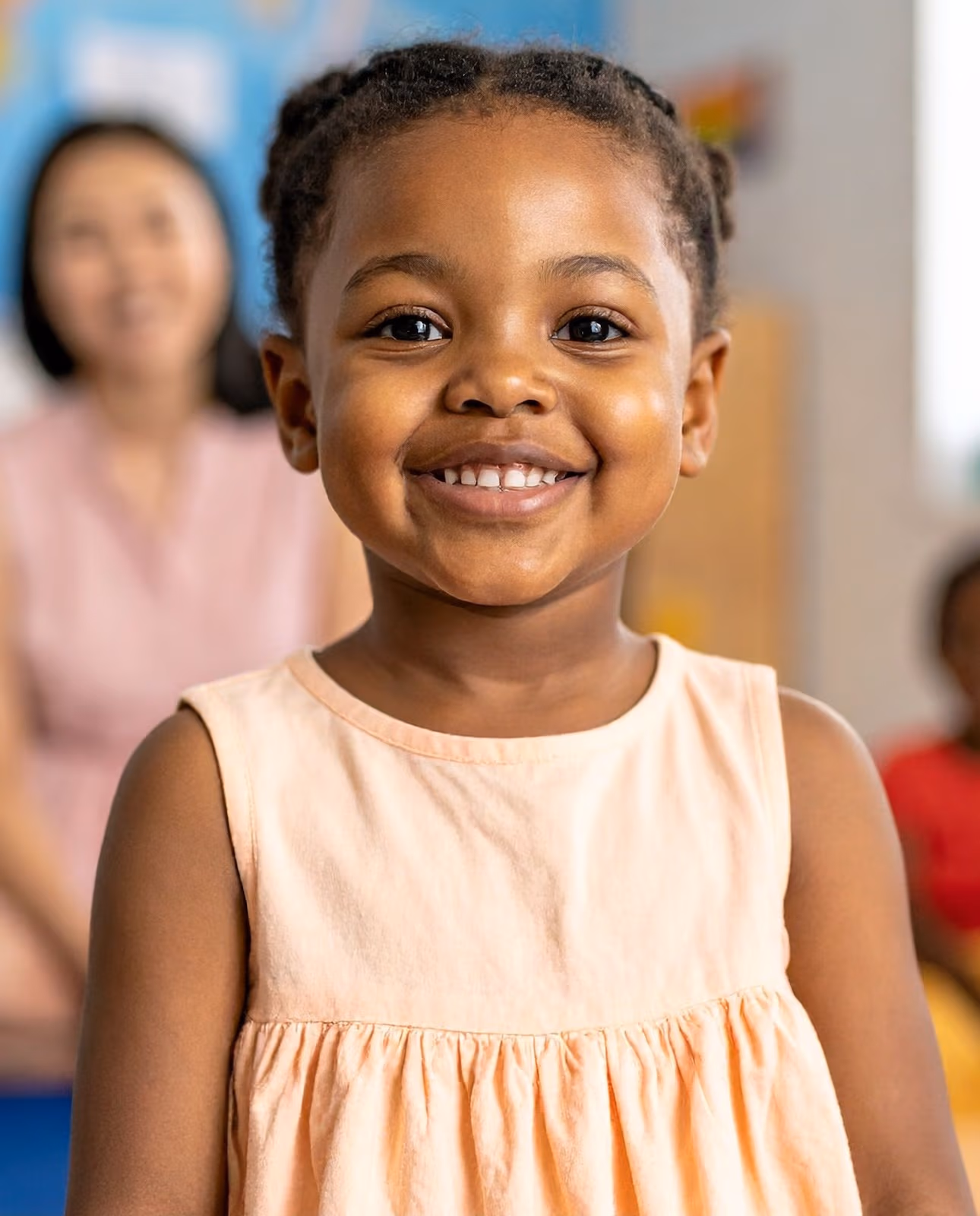 Smiling preschooler at New Life Early Learning Academy